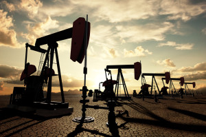 Oil pumps on the sunset sky